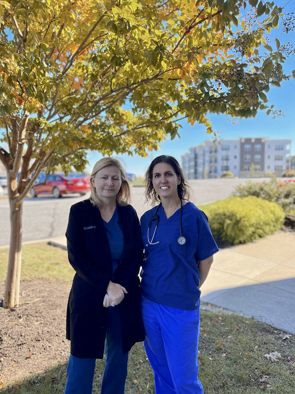 Image of Dr. Wisinski and Dr. Halley outside on a beautiful fall day