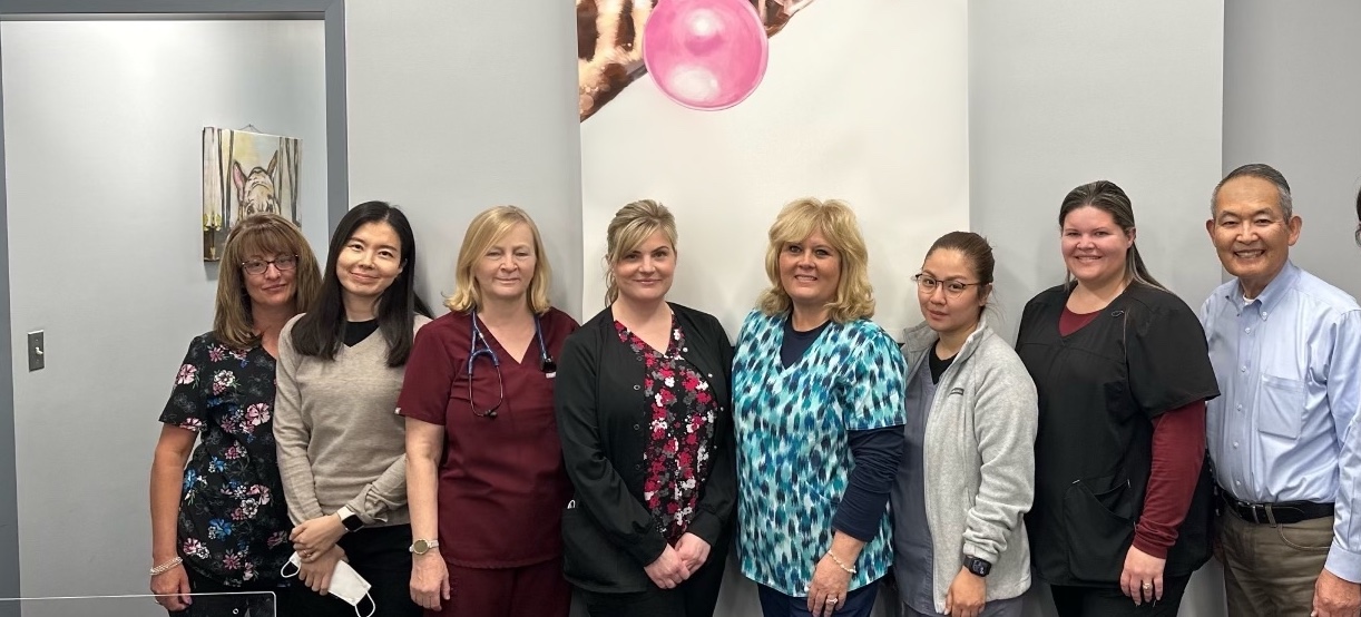 An image of the Honeygo Pediatrics LLC staff including nurses, office receptionists, Dr. Wieslawa D. Wisinski, Dr. Stephanie Skrobiszewski, and Dr. Christina Green