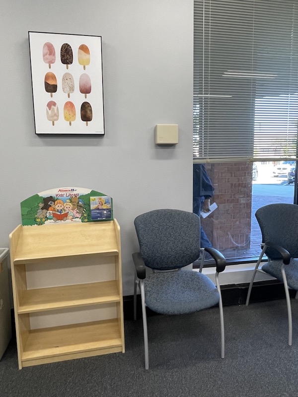 Image from the inside of Honeygo pediatrics waiting room. Full of cute children decor.